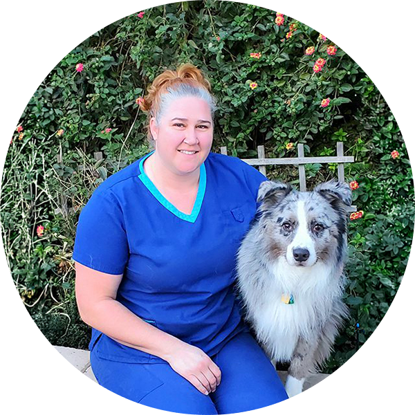 Dr Matthews with dog circle Headshot